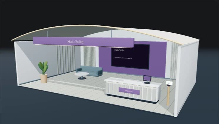 Current Halo Suite booth preview with a vaulted roof, lounge, presentation screen and welcome counter